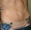 flowers tattoo on stomach 